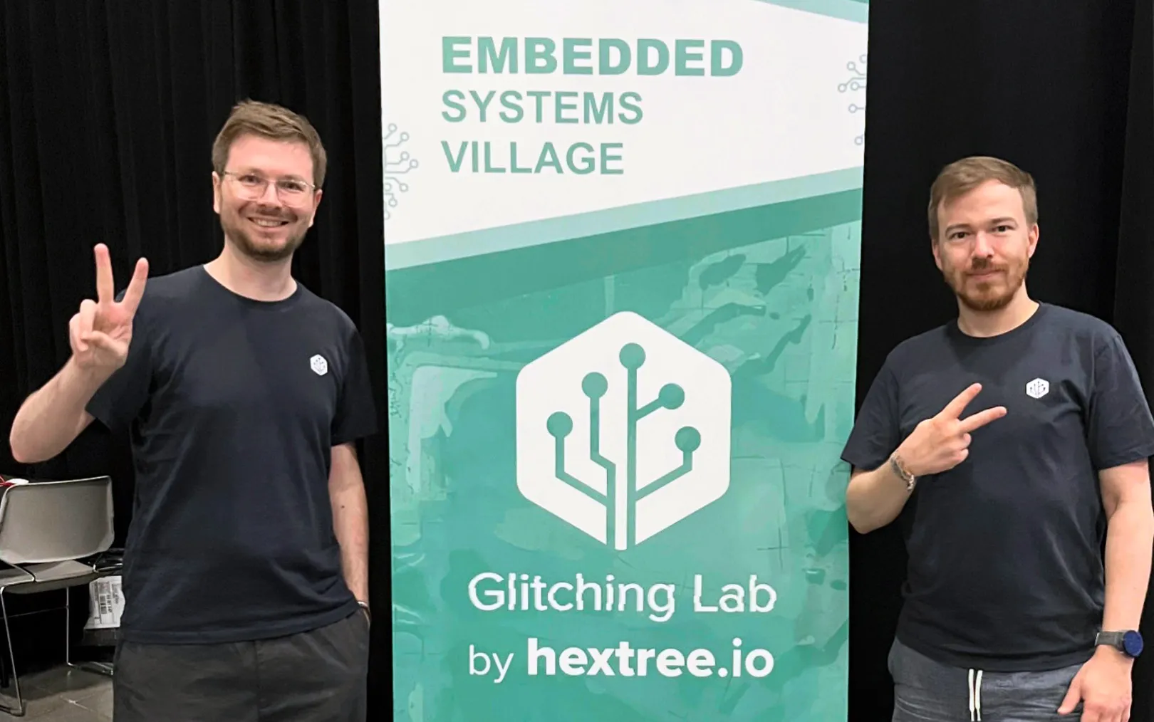 Attendees learning hardware fault injection at the Hextree DEF CON booth