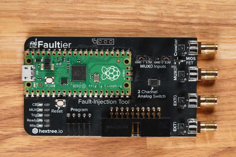 Faultier board with a Raspberry Pi Pico, headers, and four SMA connectors